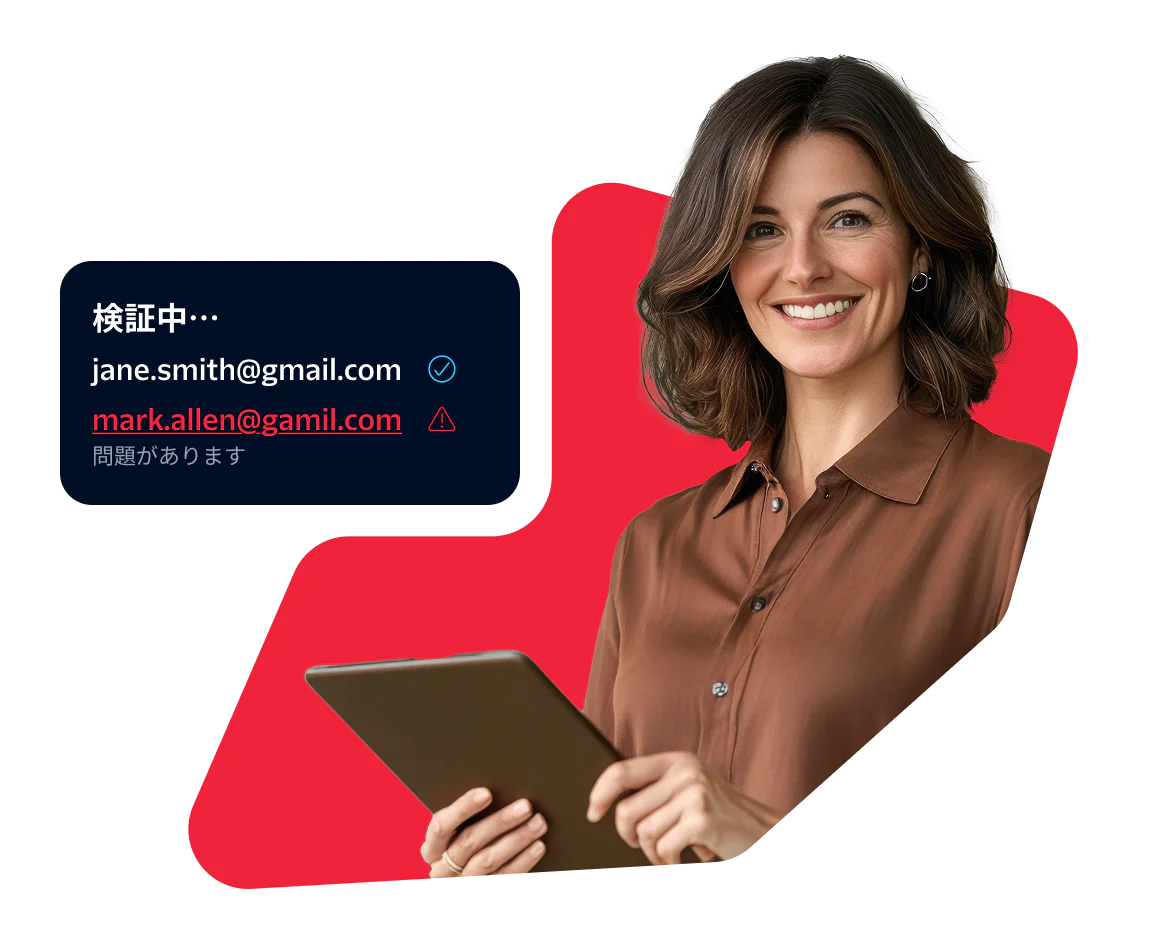 Woman holding a tablet with a screen showing email validation results