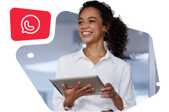 Man looking at a smartphone with WhatsApp Business status displayed online.