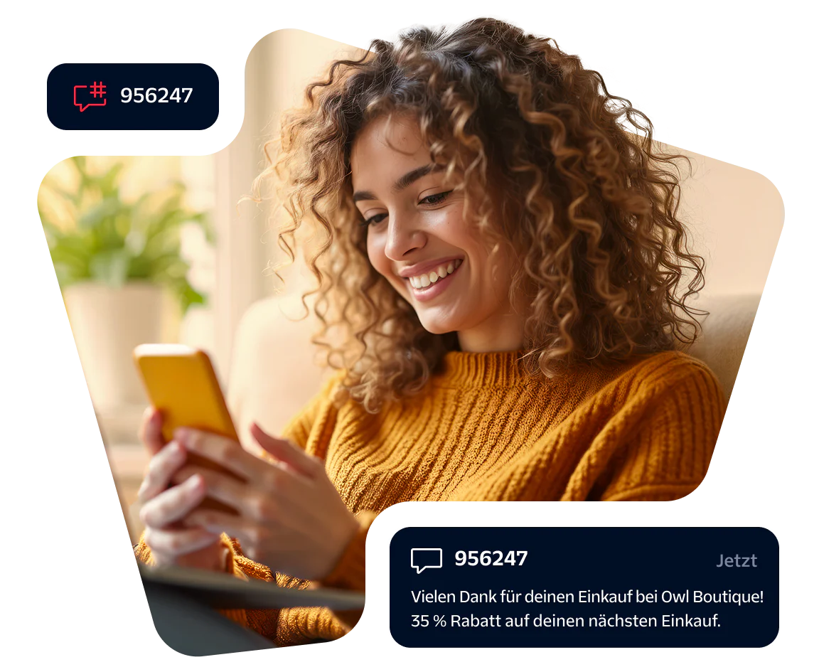 Smiling woman looking at smartphone with discount notification popup on screen.