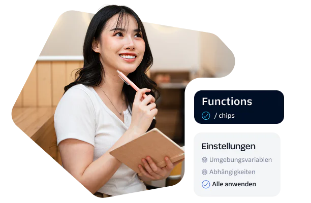 Woman holding a notebook and pen, sitting in a workspace with development settings on the side.