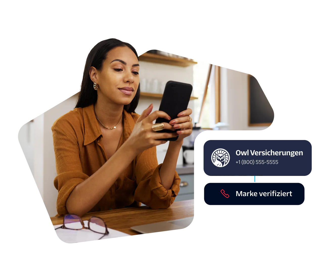 Woman in brown shirt looks at smartphone, Owl Insurance contact info displayed.