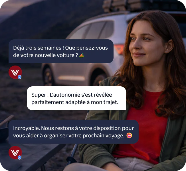 Woman sitting near car with customer service text messages about car's performance.