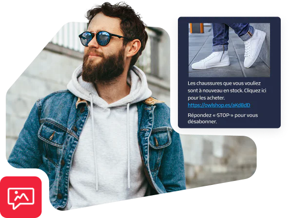 Man in denim jacket and sunglasses with phone text about shoes being back in stock.