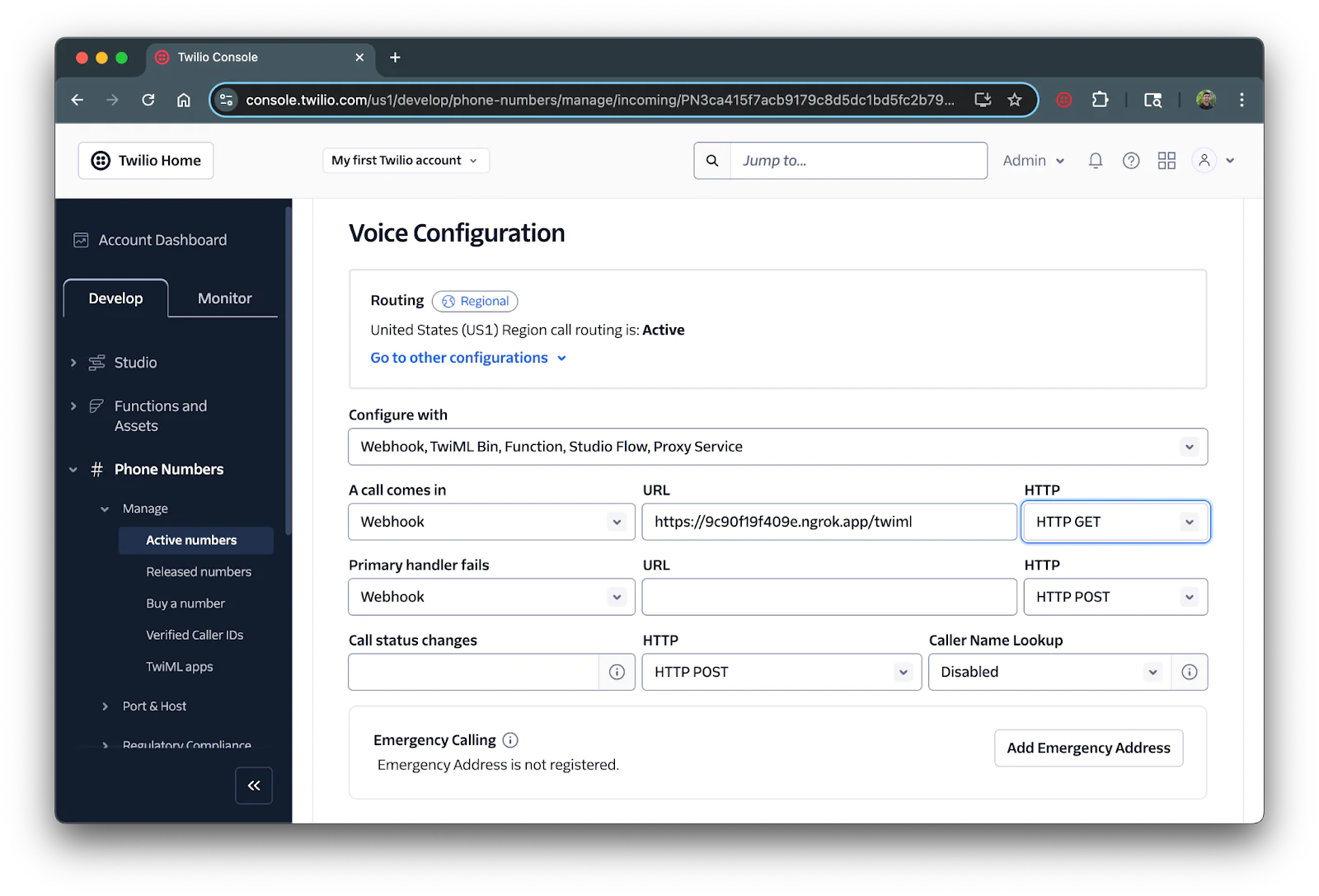 Voice configuration section of a Twilio number showing the forwarding URL in the webhook URL textbox.