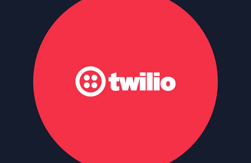 Twilio's logo featuring white text and icon on a red circle with a dark blue background.