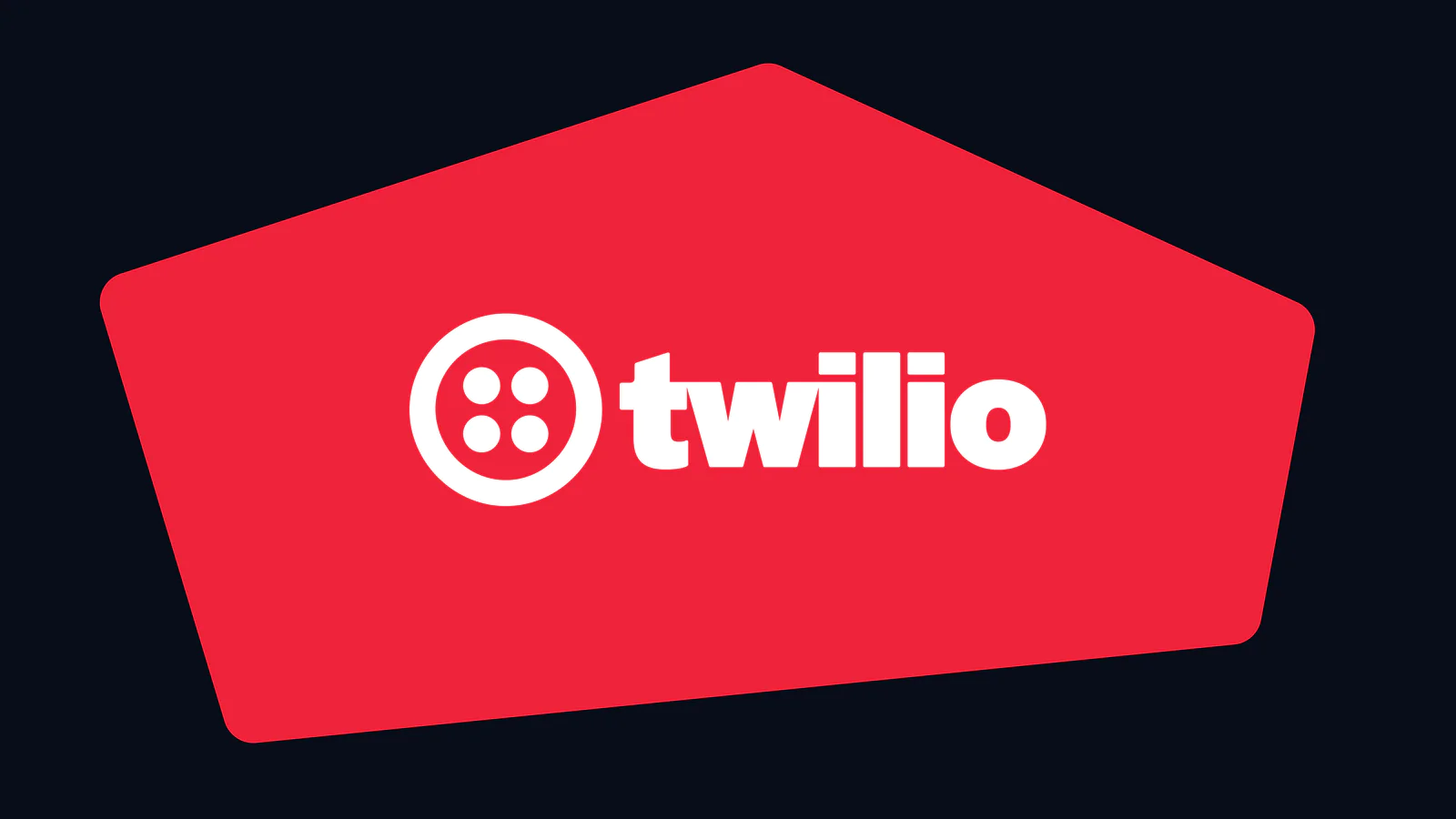 Twilio logo in white on a red pentagon shape with a black background.
