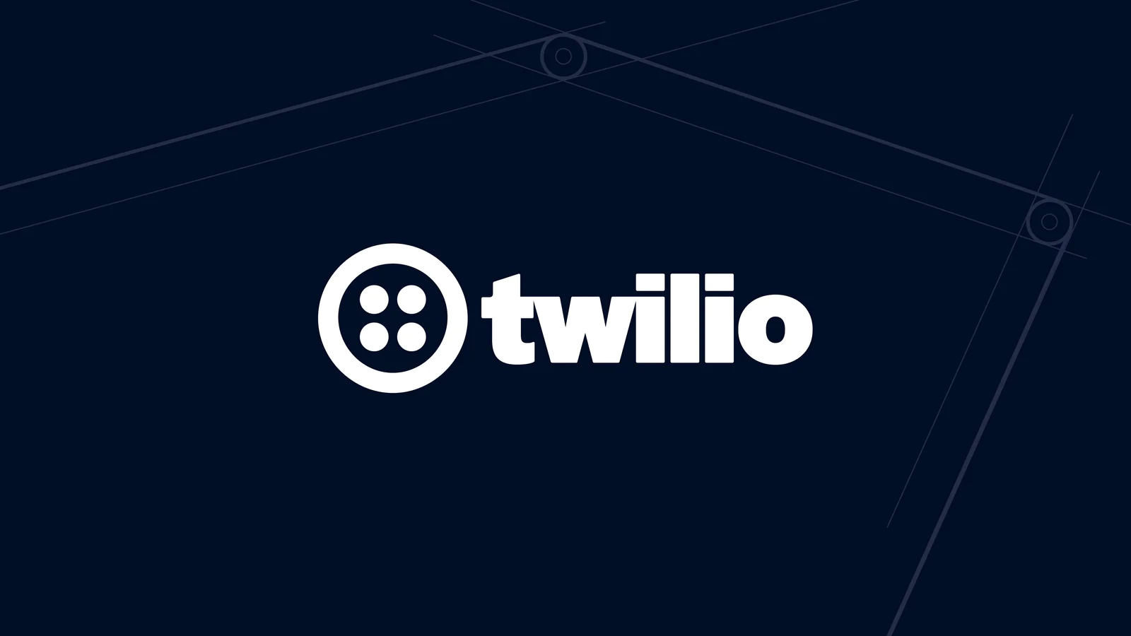 White Twilio logo with four dot design on a dark background