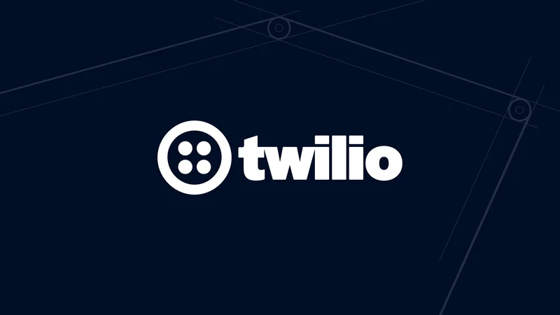 White Twilio logo with four dot design on a dark background