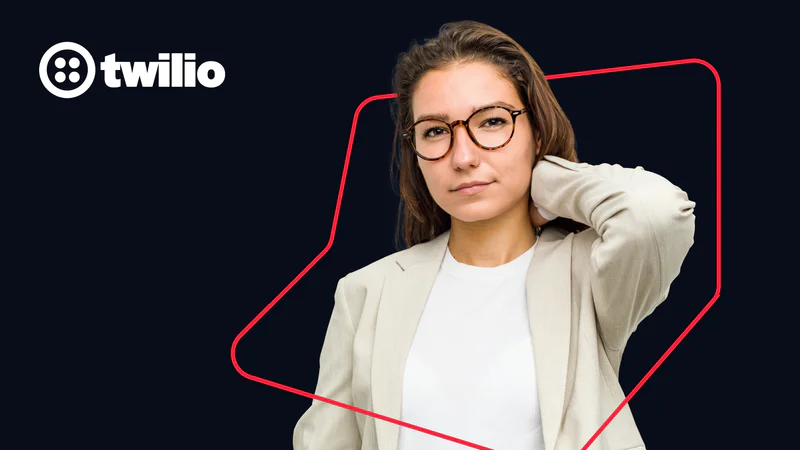 Woman wearing glasses and business attire standing beside Twilio logo on a dark background.