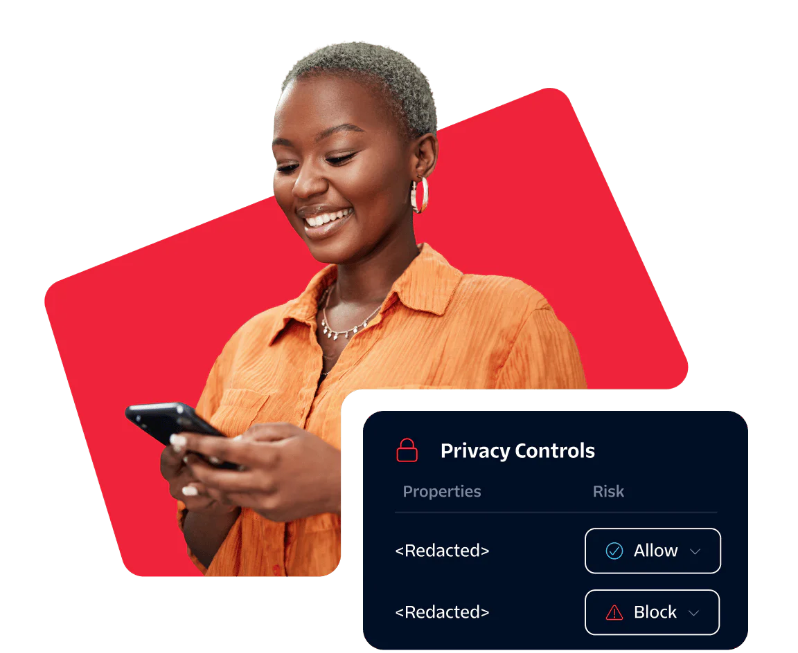 Woman Adjusting Privacy Controls on Mobile Device Smiling woman looking at her phone with privacy control options displayed on the screen.