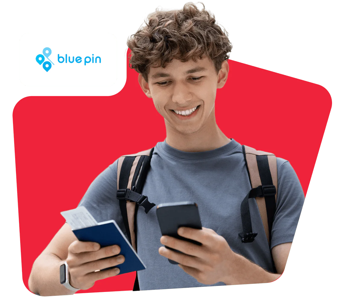Young man holding a passport and phone, using Blue Pin app, with a backpack on and red background.