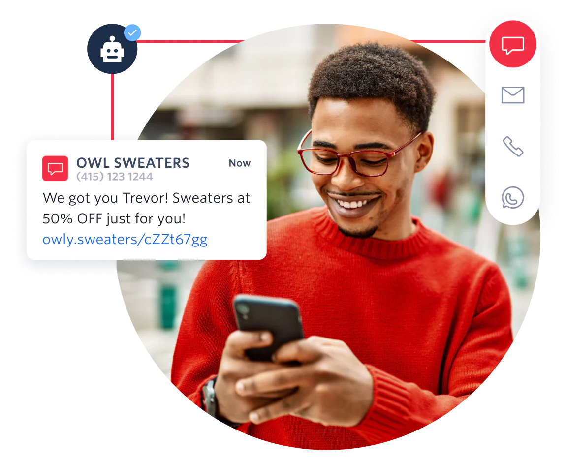 Man in red sweater checks phone for sweater discount notification from Owl Sweaters.