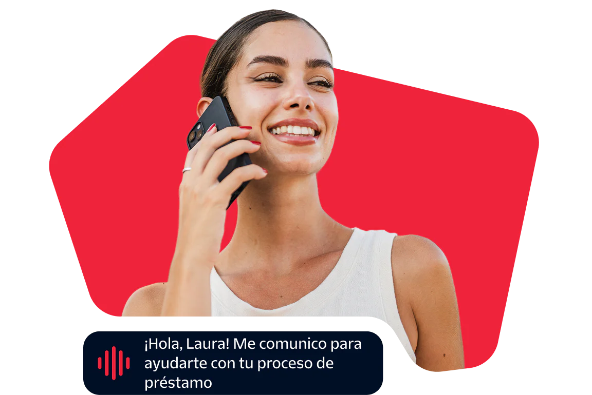 Woman smiling while talking on the phone about a loan process