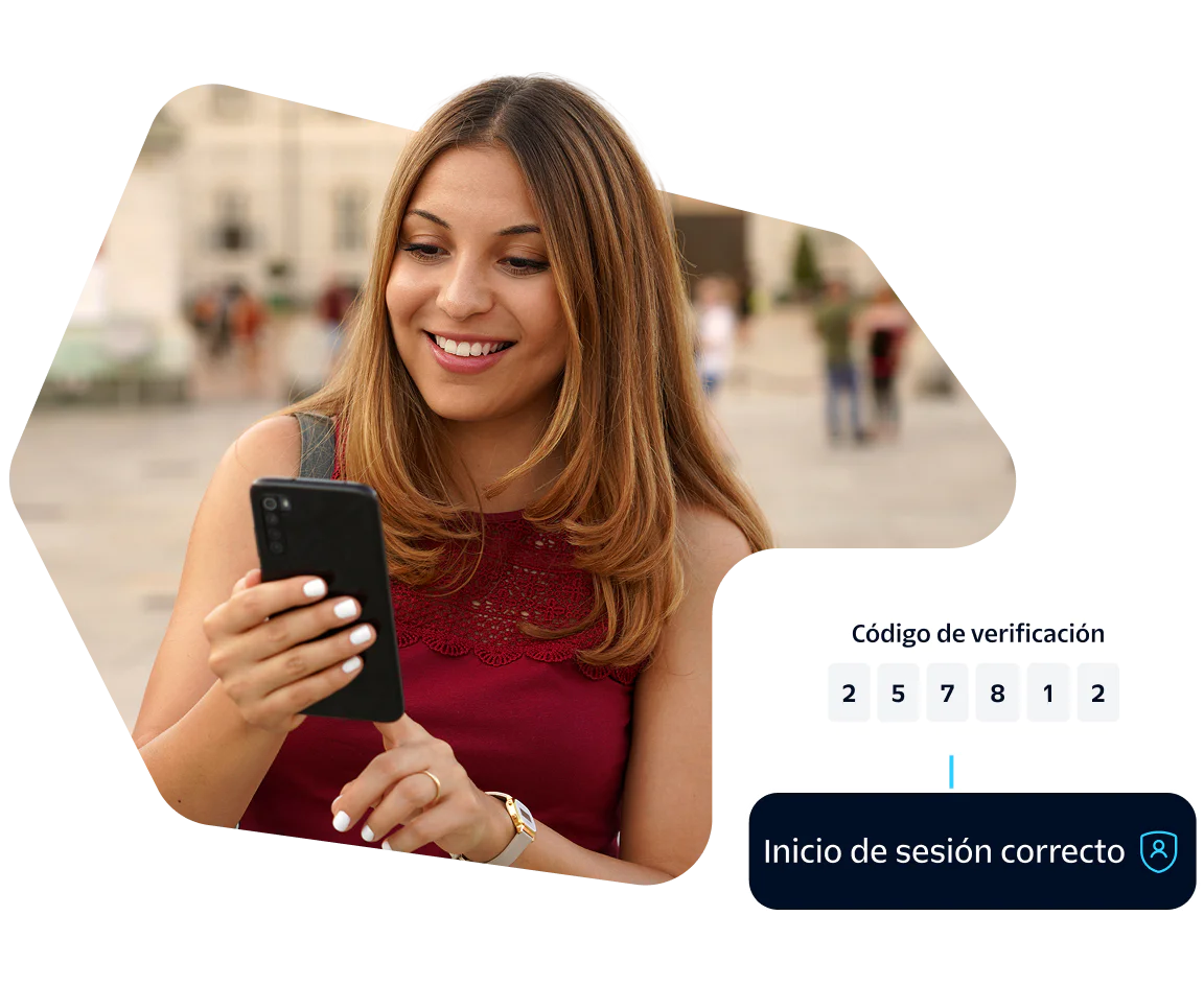 Woman entering verification code on smartphone with a Successful login message displayed.