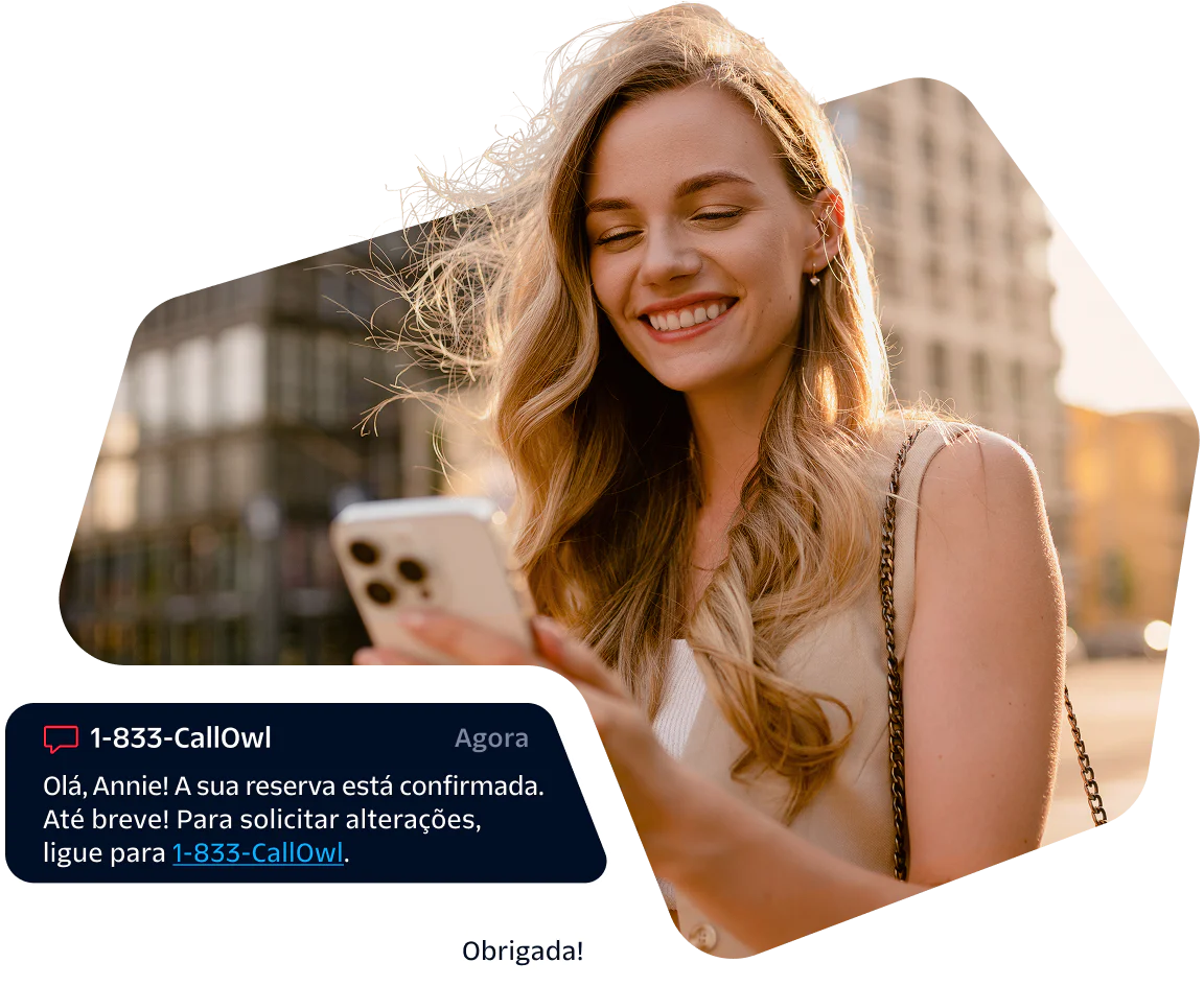 Smiling woman looking at her phone with a booking confirmation message displayed.